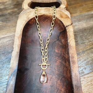Golden Toggle Necklace with Crystal Pendant"